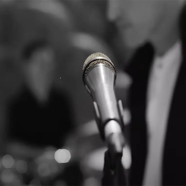 Still from The Script's "At Your Feet" lyric video.