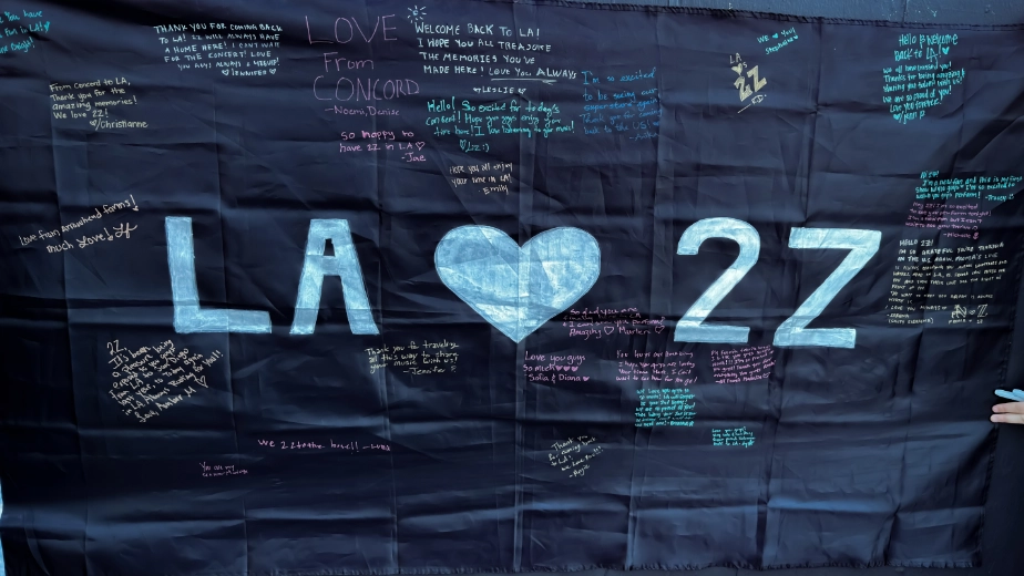 A flag that was signed by fans outside of the Brickroom LA for 2Z.