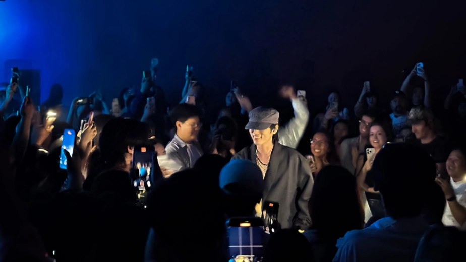 eaJ begins his concert coming through the crowd making his way to the stage.