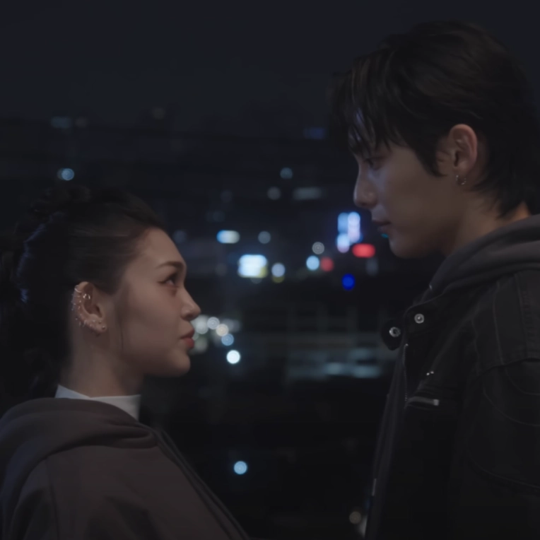 Still from JUNHEE and AleXa's music video for Kpop Demon Hunters cover of "Free."