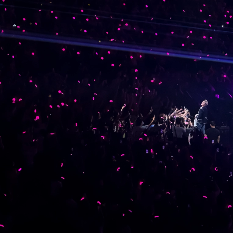 G-Dragon staring into the sea of lights during night 2 of the 'Übermensch World Tour' at Crypto Arena in Los Angeles.