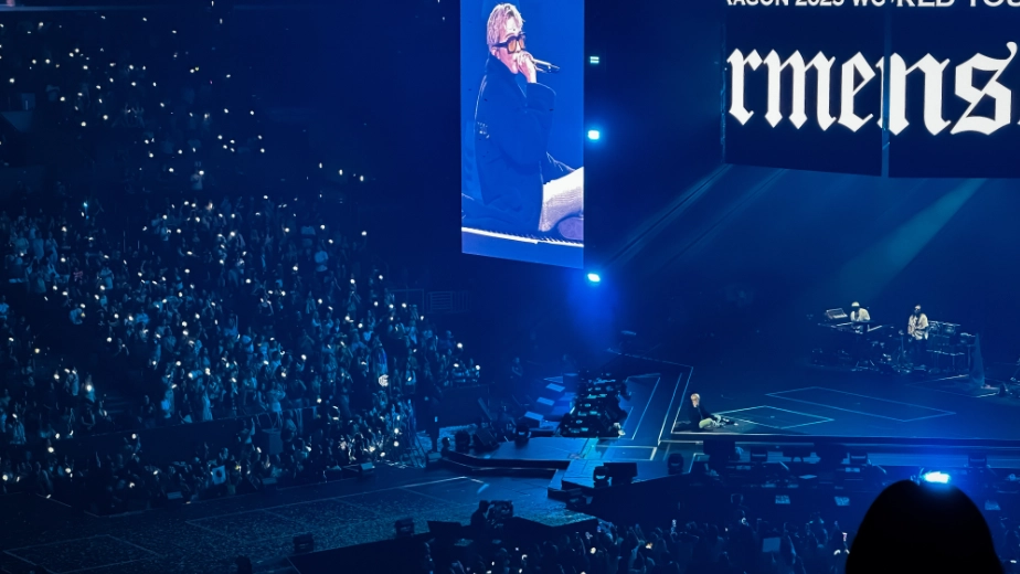 G-Dragon rests during the closing of his show at Crypto Arena.