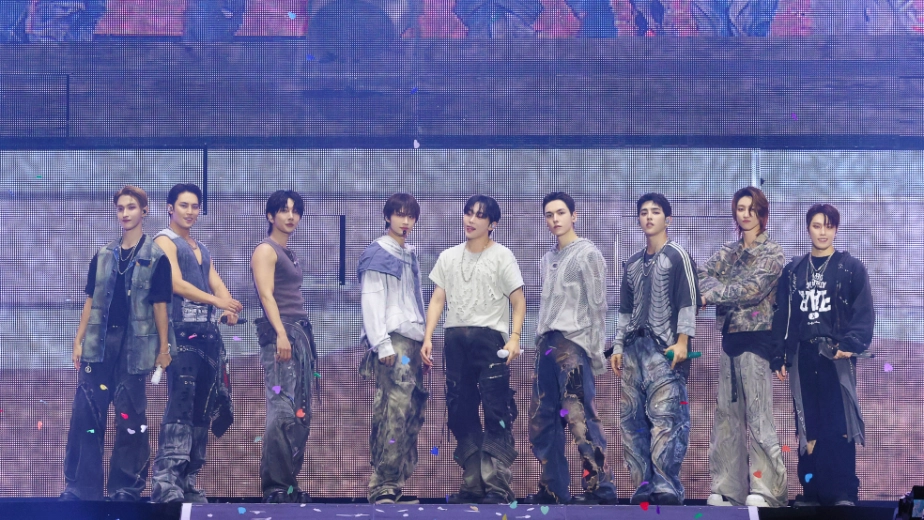SEVENTEEN posing for the crowd during night 1 of their '[NEW_] World Tour' stop at BMO Stadium in Los Angeles.