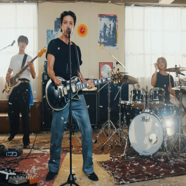 Still from CNBLUE's music video for their latest single, "Killer Joy."