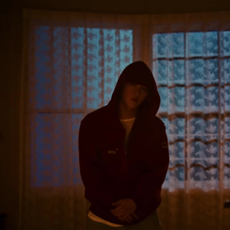 Still from Joohoney's music video for his latest single, "Sting."