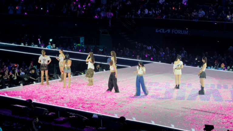 TWICE interacting with their ONCE fan base, figuring out which encore songs they should perform.