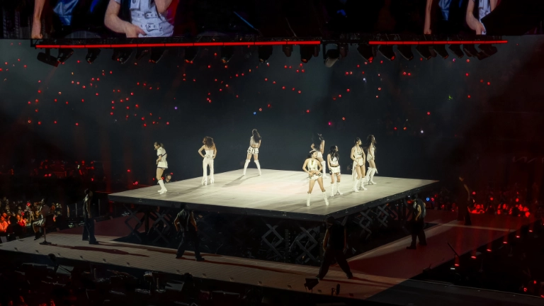 TWICE taking to the sky to perform on their lifted stage.