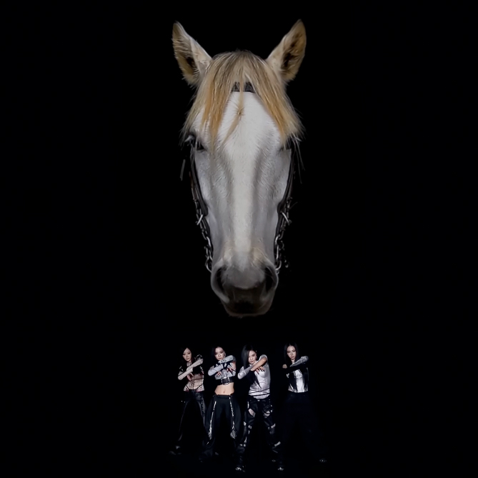Still from aespa's music video for their latest single, "WDA (Whole Different Animal)" featuring G-Dragon.