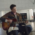 Still from The Script's music video for "The Crowd Was Singing Wonderwall."